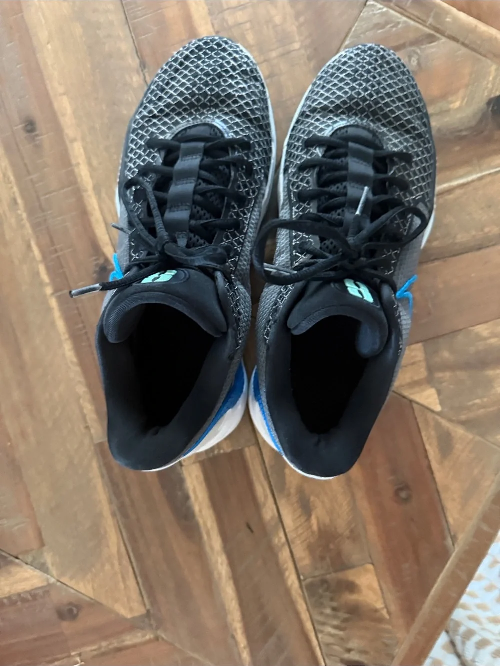 Nike Men’s Gray Athletic Shoes with Blue Swoosh